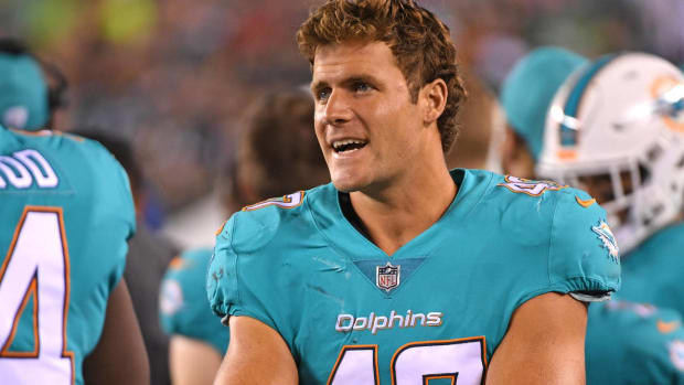 Dolphins linebacker Kiko Alonso looks ahead on  the sidelines of a preseason game.